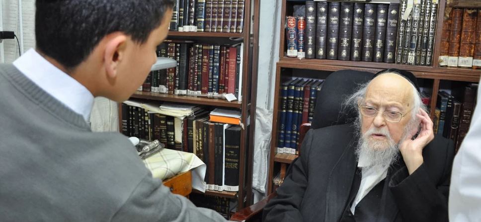 Rabbi Yosef Shalom Elyashiv zt"l was the leader of Torah Jewry until his death in 2012 and a supporter of Zion orphanage. Here he greets Zion boys at his home in Jerusalem.