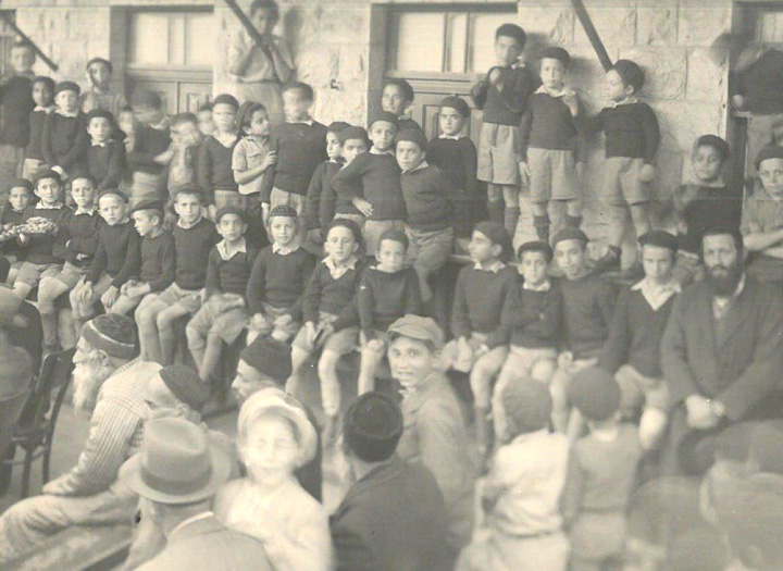 Zion boys listening to a guest speaker on campus.