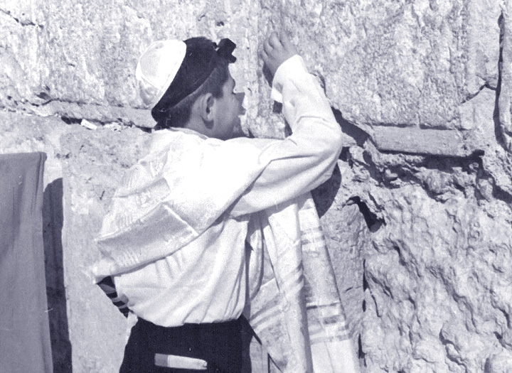 A Zion boy in the 1970s praying at the Western Wall on the day of his Bar Mitzvah.