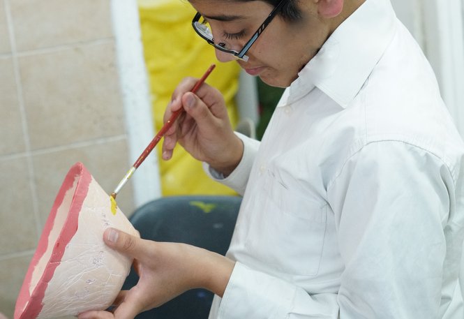 A Zion boy enjoying our arts and crafts program.