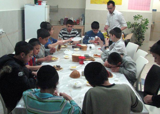 One of our many family units is enjoying breakfast as they prepare to go to school.
