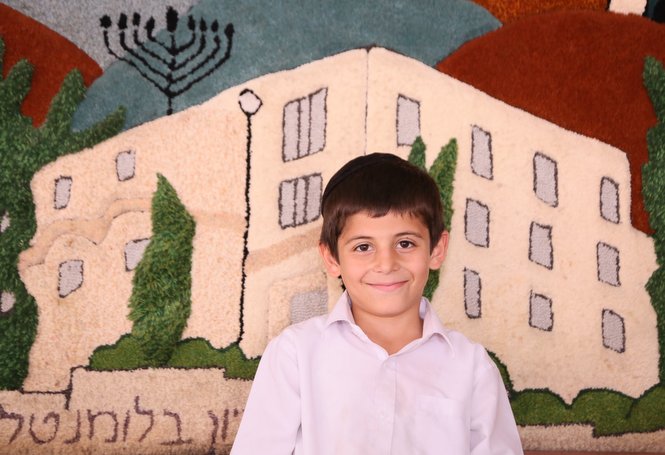 Featured this week is a Zion boy posing in front of one of the many decorations on campus...