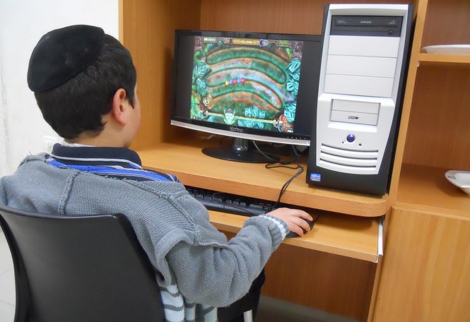 The Zion boys enjoy an array of computer activities including games, graphics and typing documents...