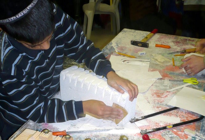 Zion boys in our arts and crafts program are hard at work preparing their projects for th...