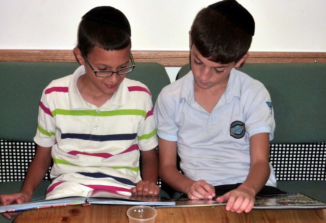 The Zion Orphanage campus library provides each boy quiet time to look through an array o...