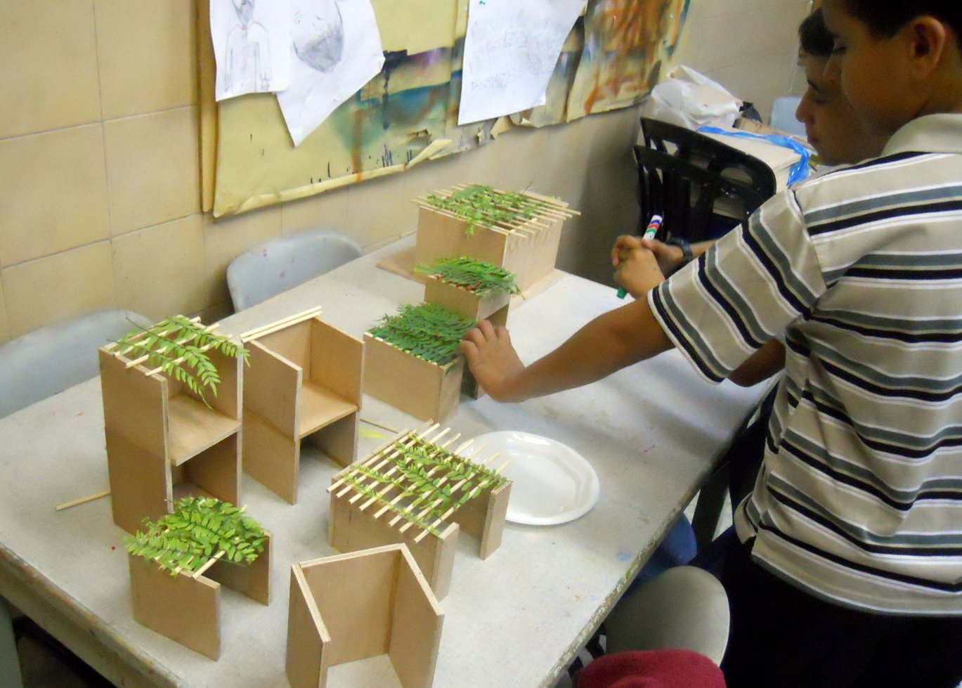 ​​During our arts and crafts course the Zion boys designed their mini-huts, known as sukkot...