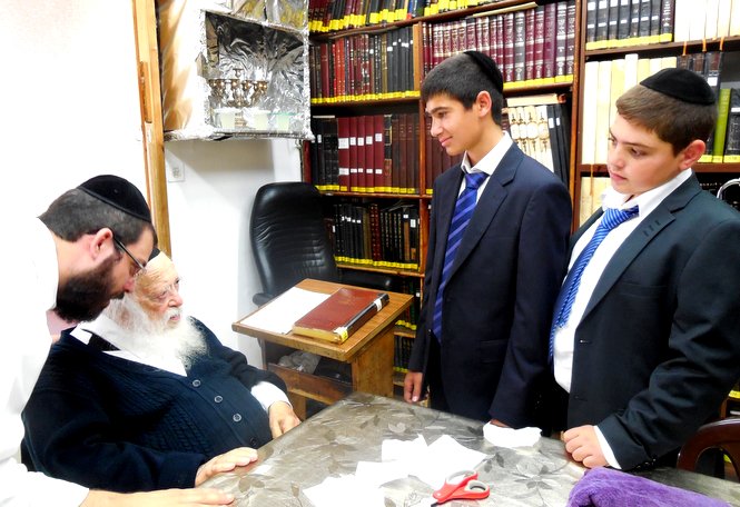 Pictured are two Zion Orphanage Bar Mitzvah boys visiting the towering Torah scholar of ou...