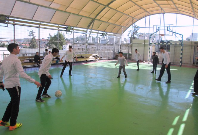 Zion boys enjoying a game of soccer on our campus rooftop sports arena. 

Through these activities...