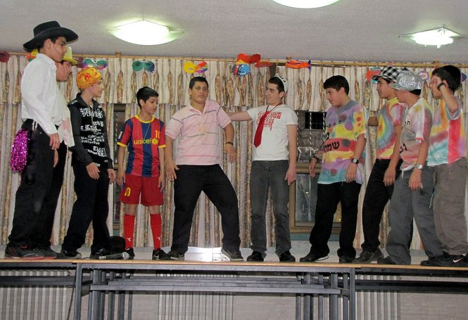 Pictured are some Zion boys performing during the annual Purim play.
The Zion Orphanage childre...