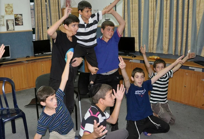 In anticipation of an upcoming performance, members of the Zion Choir practice their choreographi...